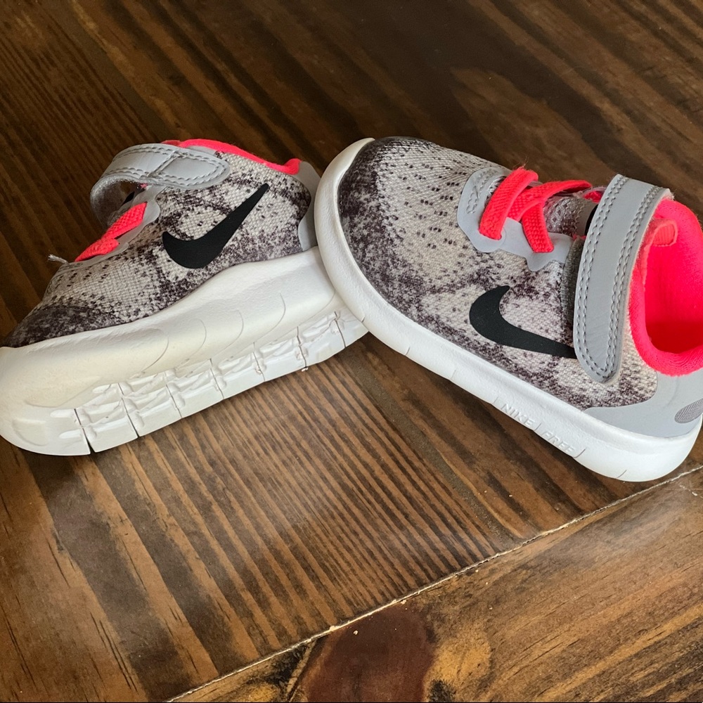 Baby Girl, hot pink and grey, Nike sneaker.  Size 4C like new gently warn